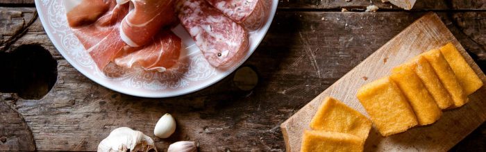 Crostini di polenta con Coppa Menatti