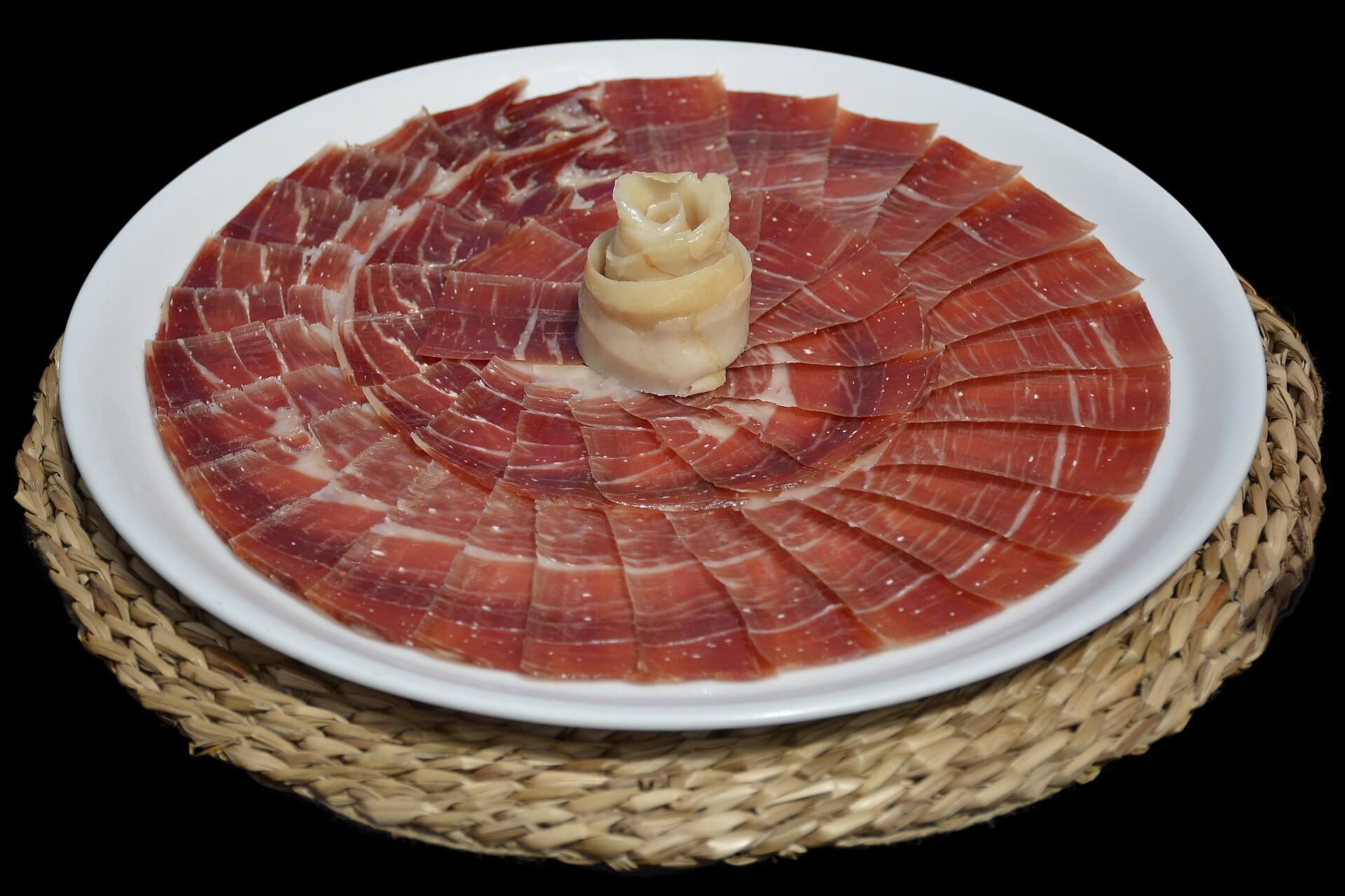 Cosa sono i puntini bianchi sul prosciutto crudo