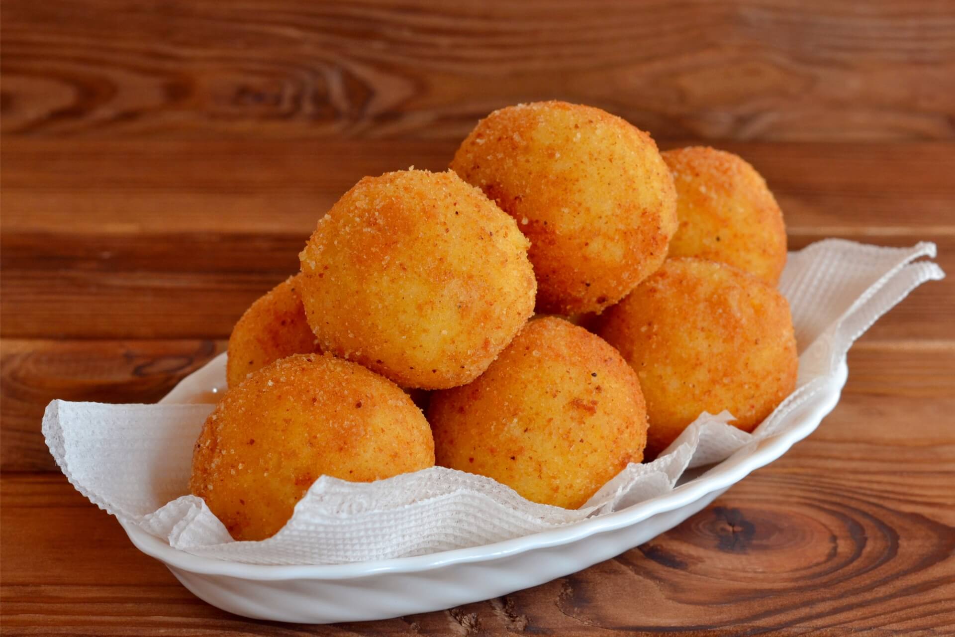 ricetta degli arancini di riso mignon con ripieno di riso, provola e prosciutto crudo